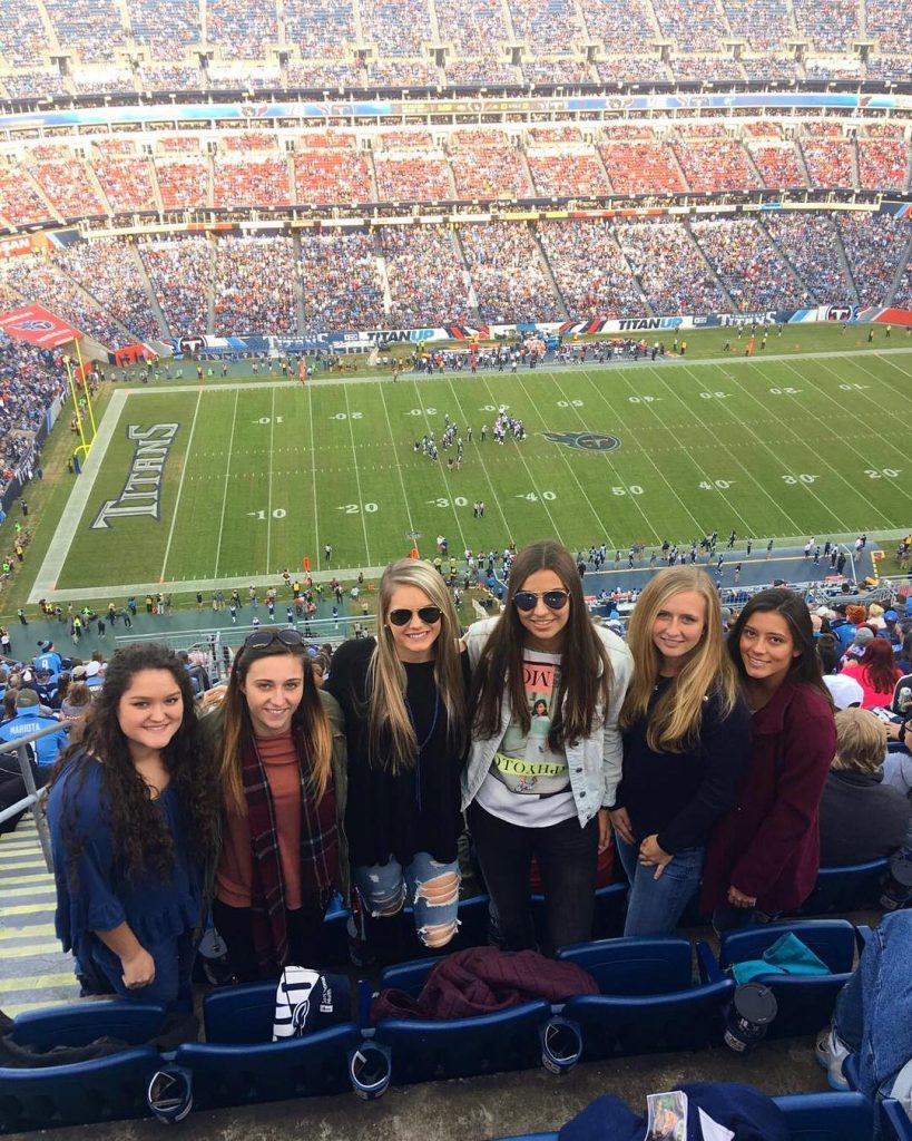 Women's Soccer Player at NFL Game - choose the right soccer scholarship